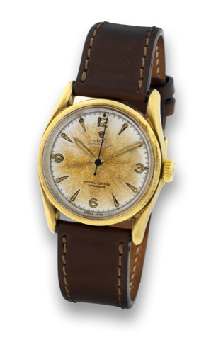 Rolex Yellow Gold Bombay.Rolex, Oyster Perpetual, Officially Certified Chronometer,.case No. 791663, Ref. 6092. Made in 1951..Very fine and rare, center seconds, self-winding, waterresistant.14K yellow gold wristwatch.