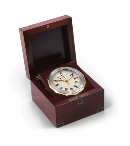 Corum, Admiral's Cup, No. 891089. Produced in the late.1990's..Fine and interesting, mahogany, steel and brass, quartz, desk.marine chrono-meter clock with date..To be sold without reserve