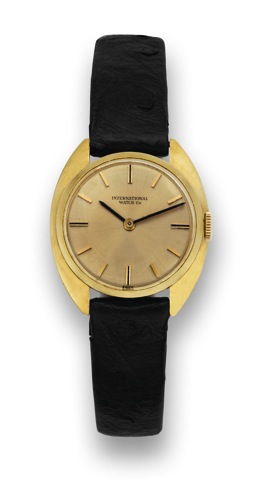 International Watch Co., case No. 1872895, Ref. 2800. Made in the 1970's..Fine, tonneau-shaped, 18K yellow gold lady's wristwatch..To be sold without reserve