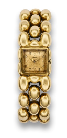 Omega Golden Nugget.Omega, movement No. 10265015, case No. 1069327.Ref. 7131. Made circa 1960..Fine, and elegant, 18K yellow gold lady's bracelet watch..To be sold without reserve