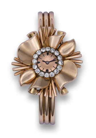 Mido, No. 17956, Retailed by Fontana. Manufactured.in the 1950's..Fine and unusual, flower-shaped, 18K pink gold and diamond.lady's convertible brooch/bracelet watch.