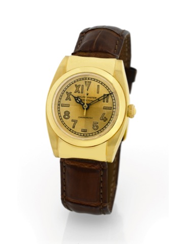 ROLEX - REF. 6065 - RIGID HOODED LUGS.Rolex, Oyster Perpetual, Chronometre, No. 27190, Ref. 6065. Made circa 1950..Very fine and rare, tonneau shaped, water-resistant, self-winding, center seconds, 18K yellow gold wristwatch.