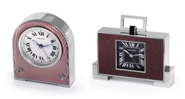 SET OF TWO CARTIER CLOCKS.A) Cartier, Ref. 2746, case No. 120232 GD. Sold on September 20, 2005..Fine, stainless steel and enamel quartz desk clock with alarm. Accompanied by a Cartier fitted box and guarantee..B) Cartier Ref. 2749, case No. 181584 GD. Ma