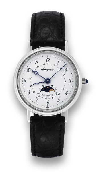 BREGUET REF. 3047 SERPENTINE.Breguet Serpentine, No. 2900, Ref. 3047. Made in the.late 1990's..Fine, astronomic, self-winding, 18K white gold wristwatch.with date, moon phases and age of the moon and an 18K.white gold Breguet buckle. Accompanied by the or