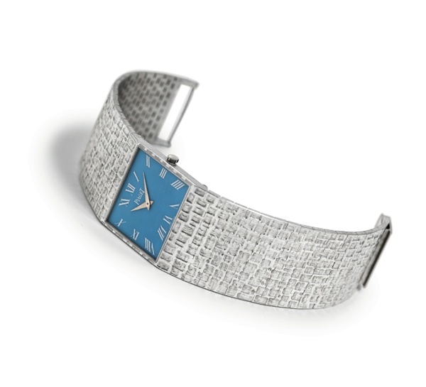 PIAGET CUFF WATCH.Piaget, case No. 28143, Ref. 92110A20. Made n the 1970's..Very fine, rare, large rectangular, 18k white gold wristwatch with an integrated 18K white gold.Piaget tapered bracelet.