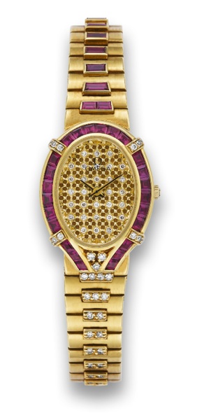OMEGA DIAMOND & RUBY DEVILLE.Omega, De Ville, case No. 47189464, Ref. BA8950020..Sold on June 18th, 2000..Very fine and elegant, oval, 18K yellow gold, diamond and.ruby, lady
