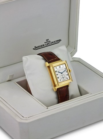 JAEGER LECOULTRE, REF..270.1.54, NIGHT/DAY YELLOW GOLD.Jaeger-LeCoultre, Reverso Duo Face.Night and Day, case No. 1754759, Ref..270.1.54. Sold in November 1994..Very fine, rectangular, two time zone.day/night indication, double-face, 18K.yellow gold wrist