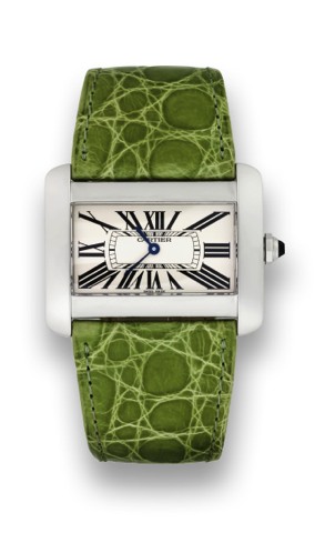 CARTIER REF. 2600, TANK.DIVAN, STAINLESS STEEL.Cartier, Tank Divan, case No. 107209CE.Ref. 2600. Made in the 2000s..Fine and unusual, horizontal rectangular.and curved, water-resistant, stainless.steel lady