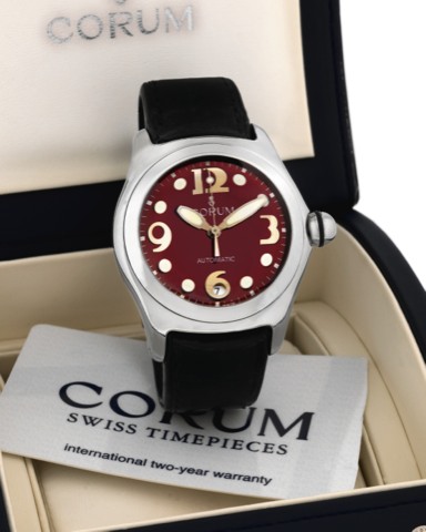 CORUM REF. 82.150.20 STEEL BUBBLE.AUTOMATIC DATE.Corum, Bubble Automatic, case No. 772687.Ref. 82.150.20. Made in 2004..Fine and unusual, large and curved, center seconds, selfwinding.water resistant, stainless steel wristwatch with date.thick domed cryst