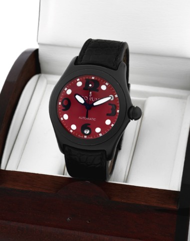 CORUM REF. 82.150.20 BUBBLE.Corum Bubble, Automatic, case No. 772904.Ref. 82.150.20. Made circa 2004..Fine and unusual, center-seconds, self-winding, waterresistant.curved, stainless steel and PVD coated wristwatch.with date, thick domed crystal creating 