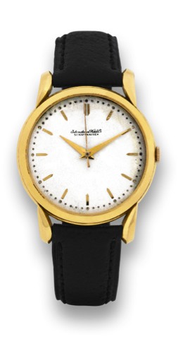 IWC YELLOW GOLD TEARDROP LUGS.International Watch Co., Schaffhausen, movement No. 1352477, case No. 1369907. Made in the 1950's..Fine, 18K yellow gold wristwatch with center seconds..To be sold without reserve