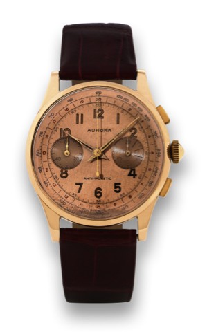 AURORA, PINK GOLD.Aurora, case No. 900. Made in the 1950s.Fine, antimagnetic, 18K pink gold wristwatch.with square button chronograph.tachometer and register.