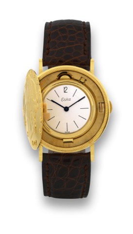ESKA 20 DOLLAR ENCLOSED COIN WATCH.Eska, Swiss, circa 1960