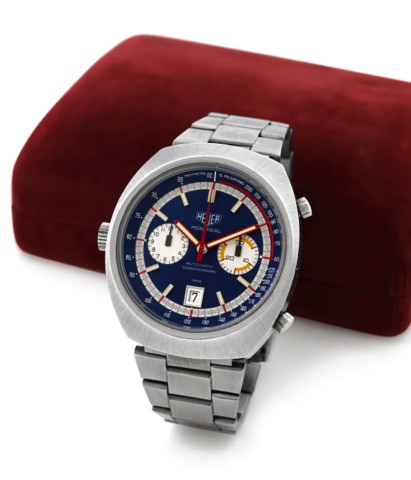 HEUER MONTREAL REF. 110.503 BLUE DIAL.Heuer, Montreal, Automatic, Chronograph, Ref. 110.503B..Made circa 1974..Fine, tonneau-shaped, water resistant, self-winding, stainless.steel wristwatch with round button chronograph, registers.date, tachometer, pulso