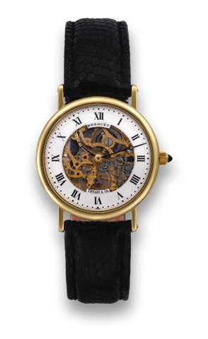 BREGUET SKELETON RETAILED BY TIFFANY & CO..Breguet, Skeleton, case No. 2469, retailed by Tiffany & Co..Made in the 1990's..Fine and elegant, thin, skeletonized, 18K yellow gold.wristwatch with an 18K yellow gold buckle.