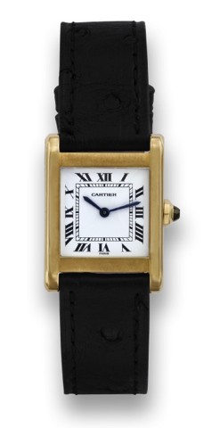 CARTIER TANK YELLOW GOLD.Cartier, Paris, Tank, case No. 780921345. Made in the 1990's..Fine and elegant, rectangular, thin, 18K yellow gold mid-sized wristwatch..To be sold without reserve