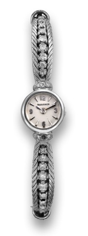 JAEGER LECOULTRE WHITE GOLD & DIAMOND.Jaeger-LeCoultre, case No. 87679A. Made in the 1960s..Fine and elegant, 18K white gold and diamond lady's wristwatch with back winding and articulated integral 18K.gold and diamond bracelet.