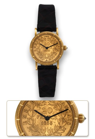 CORUM 20 FRANC COIN WATCH.Corum, Coin Watch, No. 504629, case No. 354316. Made.in the 1980's..Fine, 18K yellow gold lady's wristwatch inserted in a 20 Franc.coin dated 1858 with an 18K yellow gold Corum buckle..To be sold without reserve