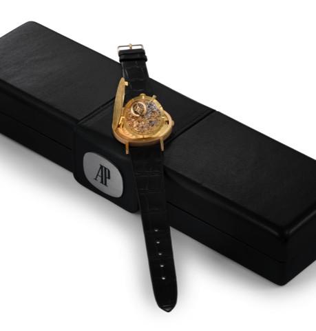 AUDEMARS PIGUET, YELLOW GOLD SKELETONIZED COIN WATCH.Audemars Piguet, Skeletonized Coin Watch, No. 162707, case No. B 2908..Made in the 1980s..Very fine, 18K yellow gold wristwatch set in a U.S. 20 Dollar coin dated 1895..Accompanied by a fitted box.