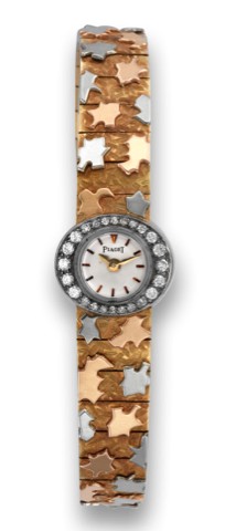 PIAGET REF. 2211 TRI-COLOR AND DIAMOND.Piaget, Swiss, case No. 99234, Ref. 2211 C28. Made in the.1960s..Very fine and unusual 18K yellow, pink and white gold and.diamond-set lady's wristwatch with backwinding with integral.bracelet.