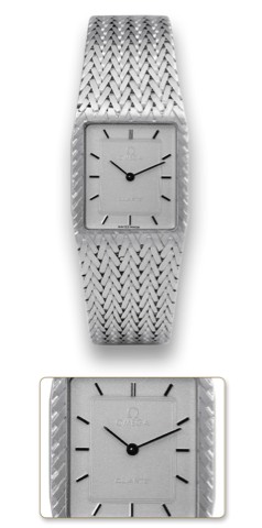 Omega, Quartz, case No. 5918460, Ref. 8462..Made in the 1980s..Fine, rectangular, 18K white gold quartz wristwatch with an.18K white gold integrated Omega twisted bracelet..To be sold without reserve