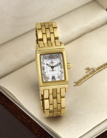 JAEGER LECOULTRE REVERSO GRAN SPORT.YELLOW GOLD.Jaeger-LeCoultre, Reverso Gran Sport, case No. 1907782.Ref. 290.1.60. Made circa 2000..Very fine, heavy, rectangular, center seconds, water-resistant.self-winding, 18K yellow gold reversible wristwatch with.