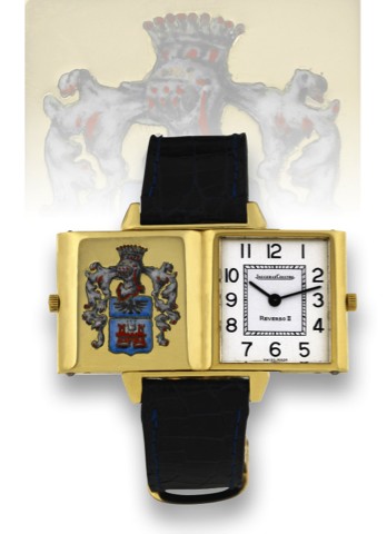 JAEGER-LECOULTRE - REVERSO II ENAMEL COAT.OF ARMS.Jaeger-LeCoultre, Reverso, No. 185413, Ref..1410031/1560663. Made in the 1980s..Very fine, rectangular, 18K yellow gold reversible wristwatch.with a 18k yellow gold Cartier deployant clasp.