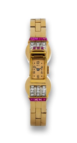 BREGUET BRACELET WATCH, DIAMOND AND.RUBY.Breguet, No. 10022, Ref. 4914. Made circa 1950..Fine and elegant, 18K gold, diamond and ruby-set lady