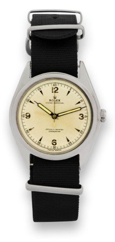 ROLEX, REF 5028, BIG BUBBLE.Rolex,Oyster Perpetual, Officially.Certified Chronometer, case No..illegible, Ref. 5028. Made circa 1950..Fine, tonneau-shaped, center-seconds.water-resistant, self-winding, stainless.steel chronometer wristwatch.