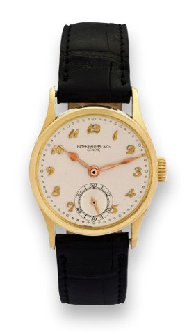 PATEK PHILIPPE YELLOW GOLD CALATRAVA – BREGUET DIAL.Patek Philippe, Genève, No. 925321, case No. 298892. Made circa 1943..Fine 18K yellow gold wristwatch.