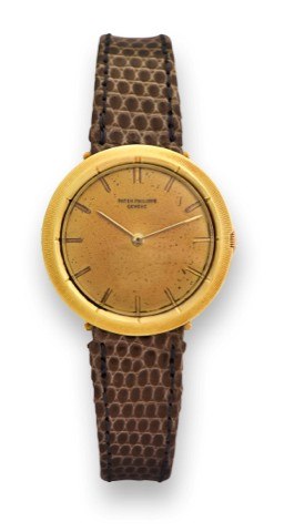 PATEK PHILIPPE REF. 3457 - YELLOW GOLD.Patek Philippe, Genève, movement No. 857640, case No. 429198, Ref. 3457. Made.circa 1963..Fine and rare, 18K yellow gold lady’s wristwatch with hooded lugs.