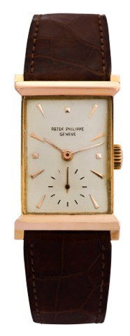 PATEK PHILIPPE REF. 2404.PINK GOLD.Patek Philippe, Genève, movement No..972098, case No. 657502, Ref. 2404..Made circa 1953..Very fine and rare, rectangular, 18K pink.gold wristwatch..To be sold without reserve