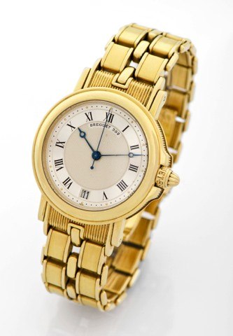 BREGUET REF. 3400 MARINE BRACELET.Breguet, Horloger de la Marine, Automatic, Ref. 392B. Made.circa 1995..Fine, center seconds, self-winding, water-resistant, heavy 18K.yellow gold wristwatch with date and an 18K yellow gold.Breguet link bracelet with doub