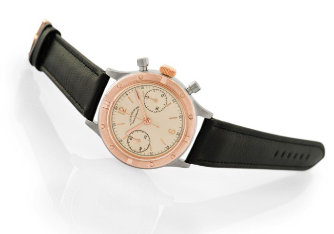 ROLEX REF. 3668, STAINLESS STEEL AND PINK GOLD.Rolex, Oyster, Chronograph, Antimagnetic, case No. 47957, Ref. 3668. Made circa 1938..Very fine and very rare, water-resistant, stainless steel and 18K pink gold wristwatch with round button.chronograph, regi