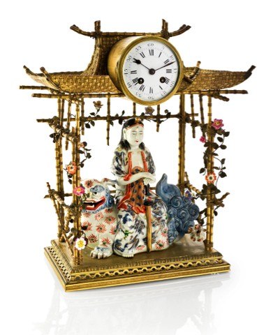 THE TEMPLE GUARDIAN PAGODA CLOCK.Japy Freres, Paris, movement No. 1183. Made circa 1880..Fine and impressive, gilt-brass and porcelain, 8-day going, hour and half-hour striking table clock.