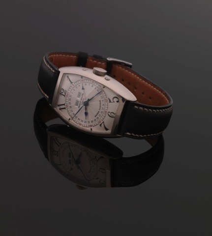 FRANCK MULLER REF. 5850 MC WHITE GOLD.Franck Muller, Genève, Cintrée Curvex Master Calendar, No. 47, Ref. 5850 MC. Made in the 1990s..Very fine, tonneau-shaped, center seconds, self-winding, 18K white gold wristwatch with triple date calendar.