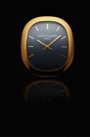 PATEK PHILIPPE ELLIPSE D'OR WALL CLOCK.Patek Philippe, Geneve. Made in the 1990's..Fine and rare, wall clock with quartz movement..To be sold without reserve