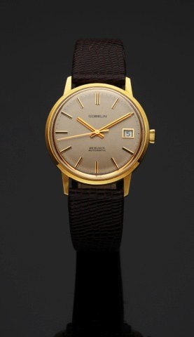 GÜBELIN REF. 2407 YELLOW GOLD.E. Gübelin, Lucerne, Swiss, No. 13050, case No. 145043.Ref. 2407. Made in the 1980s..Fine, center seconds, self-winding, water-resistant, 18K yellow.gold wristwatch with date..To be sold without reserve