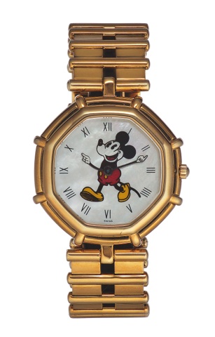 GERALD GENTA REF. 2860.7.MICKEY MOUSE, YELLOW GOLD.Gérald Genta, Genève, Disney, case No. 53891.Ref. 2860.7. Made in the 1990’s..Fine and unusual, octagonal, 18K yellow gold quartz.wristwatch with an integral 18K yellow gold Gérald Genta.fancy link bracel
