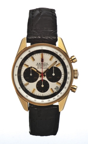 ZENITH, REF.1205, EL PRIMERO, YELLOW GOLD.Zenith, Chronograph, Automatic, El Primero, case No..204E219, Ref. 1205. Made in the 1970s..Fine and rare, tonneau shaped, self-winding, waterresistant.18K yellow gold wristwatch with round button.chronograph, reg