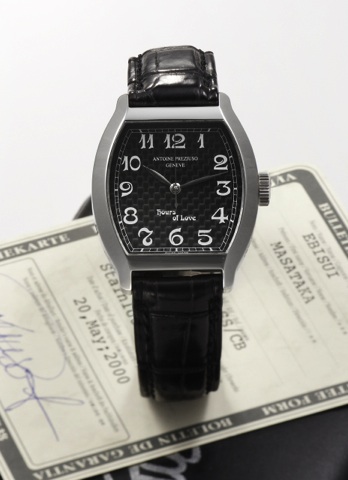 ANTOINE PREZIUSO, HOUR OF LOVE.LIMITED EDITION, STEEL.Antoine Preziuso.Genève, Hours of Love.No. 001. Made in a.limited edition of 200.pieces in 2000. Sold on.May 20th, 2000..Fine and rare, tonneaushaped.center seconds.self-winding, waterresistant.stainle