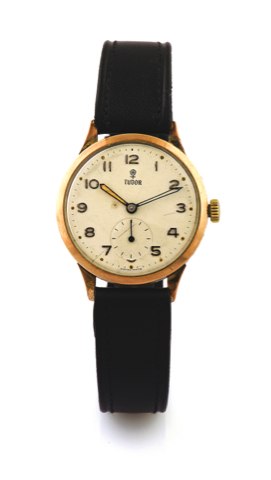 TUDOR, ARABIC NUMERAL INDEX, GOLD.Tudor, No. 1829. Made in the 1940s. Fine and rare.9K gold wristwatch..To be sold without reserve
