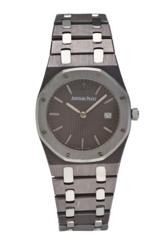 AUDEMARS PIGUET, ROYAL OAK.CHAMPIONSHIP TANTALUM AND STEEL.Audemars Piguet, Genève, Royal Oak Championship.No.1486, case No. D64859. Made in the 1990s..Fine, tonneau-shaped, water-resistant, tantalum and.stainless steel wristwatch with date, and tantalum 