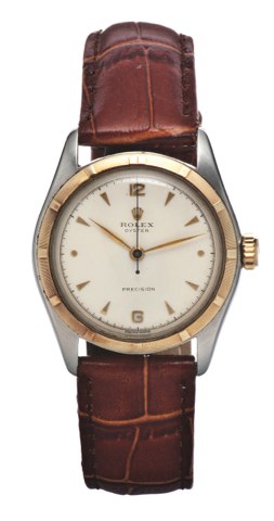 ROLEX, REF. 5059, STEEL AND GOLD.Rolex, Oyster Precision, case No. 639353, Ref. 5059..Made circa 1950. Fine and rare, tonneau-shaped, center.seconds, water resistant, yellow gold and stainless steel.wristwatch..To be sold without reserve