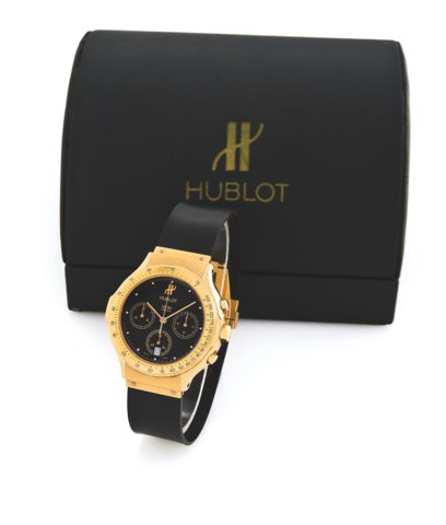 HUBLOT, REF. 1620.8, YELLOW GOLD QUARTZ CHRONOGRAPH.hublot, genève, case No. 212868, Ref. 1620.8. Sold on December 25th, 1989..Fine, water-resistant, 18k yellow gold quartz wristwatch with round button.chronograph, registers, tachometer and date, with rub