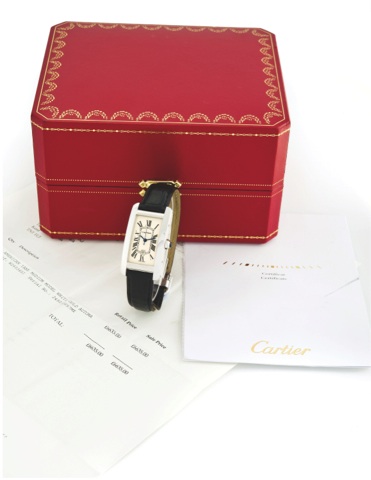 CARTIER TANK AMERICAINE, WHITE GOLD.Cartier, Tank Americaine,, case No. 70657MX.Ref. 2490. Sold on July 15th, 2008..Very fine, rectangular curved, center seconds.self-winding, water-resistant, 18k white gold wristwatch.with date and an 18k white gold Cart
