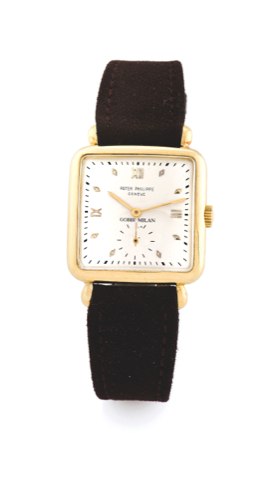 Patek Philippe Ref 2492 Gobbi Milan Yellow Gold.Patek Philippe, geneve, Gobbi Milan, Movement No. 957556, case No. 666732..made in the 1950’s..Fine and rare, square shaped, 18K yellow god wristwatch with an 18K pink gold.buckle.