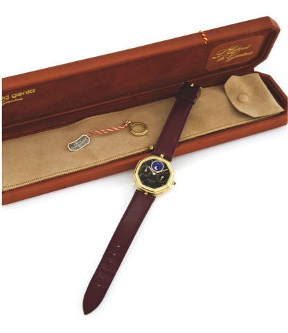 GERALD GENTA DAY DATE MOON.Gérald Genta, Genève, Automatic, No. 9, No. 26518.Ref. G 2747.4. Made in the 1980’s..Fine, octagonal, astronomic, self-winding, 18k yellow.gold wristwatch with day and date, moon phases and an.18k yellow gold Gérald Genta buckle