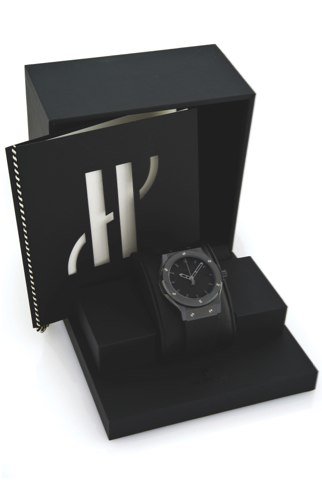 HUBLOT ALL BLACK FUSION.Hublot, Genève, Big Bang All Black fusion, Automatic.No. 487/500, case No. 860387, Ref. 542.CM.1110.RX. Made.in a limited edition of 500 pieces in 2010, sold August.25th, 2010..Fine and unusual, self-winding, center-seconds, water.