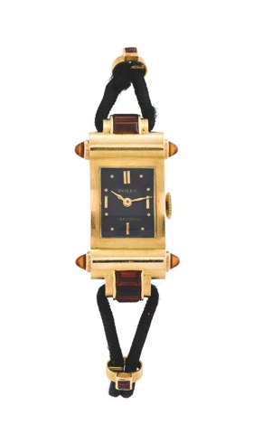 ROLEX REF. 4567 YELLOW GOLD, BLACK DIAL.Rolex, Precision, case No. 46946, Ref. 3410. Made in the 1930’s..Very fine and rare, rectangular, 18K yellow gold lady’s wristwatch with.citrine stones on a black cord.